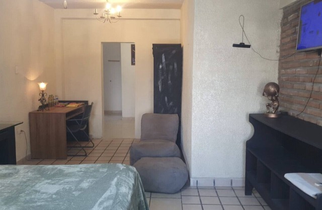 Room near the airport with pool