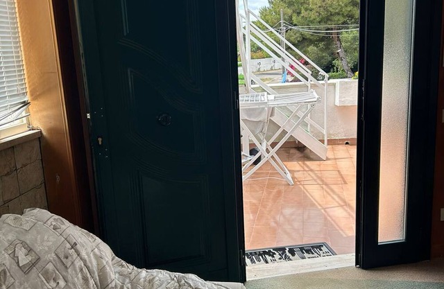 Room 'Orchidea' with Sea View, Shared Terrace and Air Conditioning