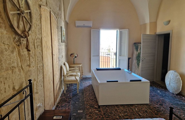Room 'Palazzo Costantini - Anturium' with Shared Terrace, Wi-Fi and Air Conditioning