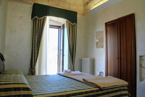 Rooms Dimora Arco - Affitti Brevi Italia
