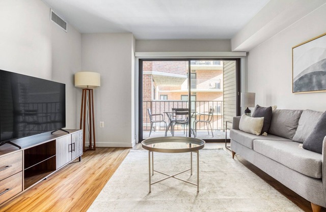 Roomy Clarendon 2BR w/W/D & Gym, across street from WF, by Blueground