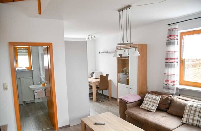 Ruhige, urgemütliche Atmosphäre mit Galerieschlafzimmer