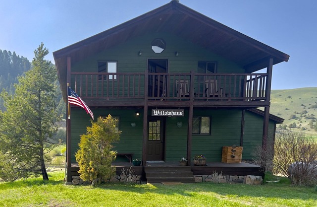 Rustic Farmhouse on 206 acres with private trout stream running through it…