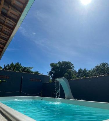 Salão para festas com piscina, bairro Jardim Melvi em Praia Grande - Salve Jorge