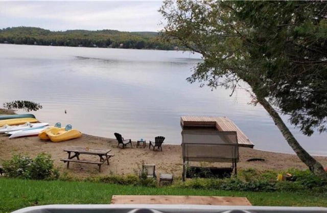 Sandy beach with spa and fire pit