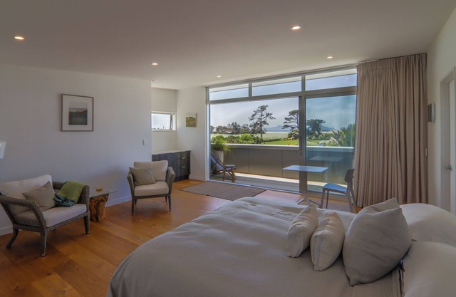 Sea and rural views from your private deck, surrounded by tropical gardens