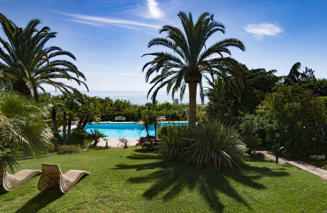 Sea view apartment with large garden and panoramic pool - VillaCapodarco