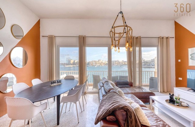 Seafront 2BR home with private balcony, AC & WIFI