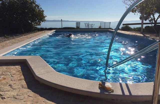 Seafront house with pool in Split,100m to the beach