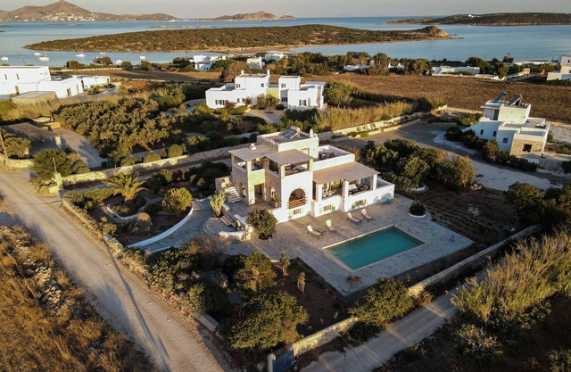 "Secluded Elegance: Three-Level Villa with Ocean Views, Pool, and Outdoor Oasis"