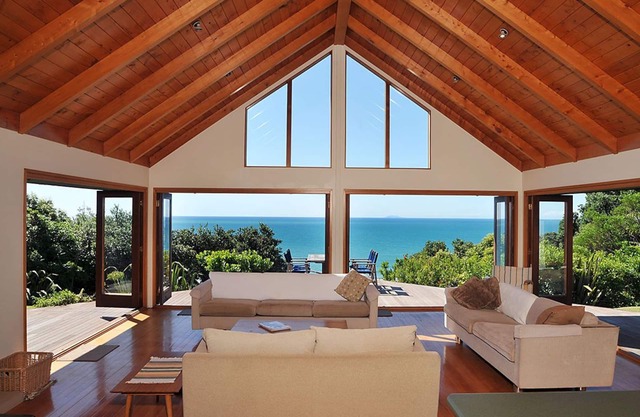 Secluded hilltop home with stunning beach views