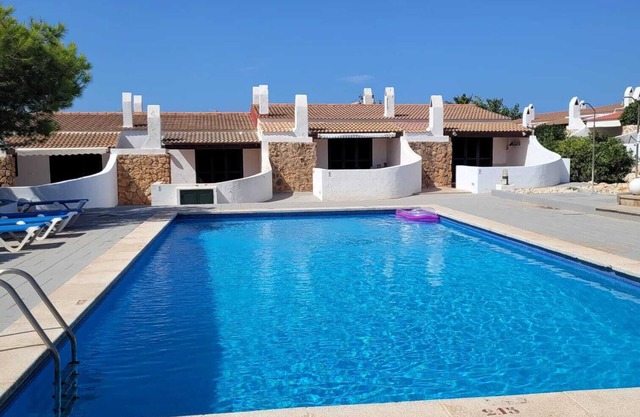 Semi-detached house with small garden 3 minutes from the Cap d´Artrutx lighthouse