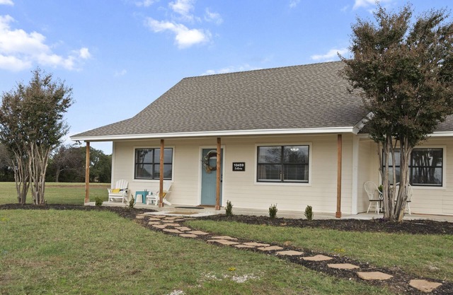 Serene farmhouse on 2 acres, perfect for family gatherings or wedding stays.