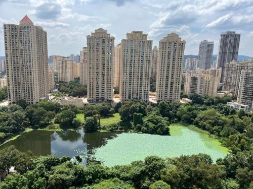Serene LakeView Studio Apartment at Hiranandani Estate, Thane