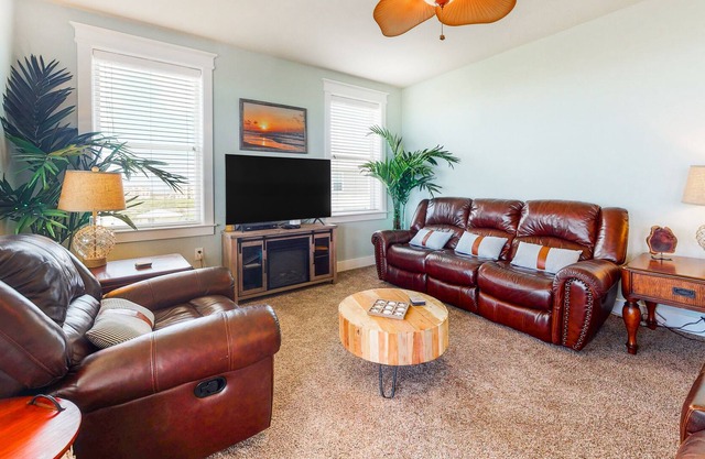 Serene waterfront condo with pool, hot tub, game room & washer/dryer