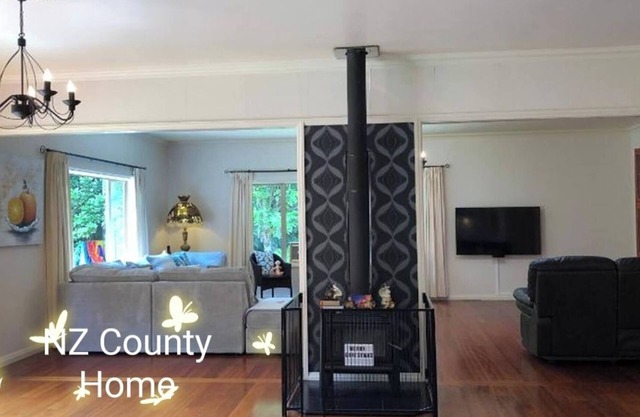 Serene Whangarei lifestyle luxurious modern home with trees and Garden Views