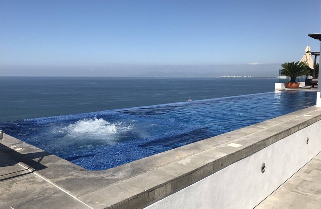 Serenita is a thoroughly modern space with an ocean view in an awesome location.