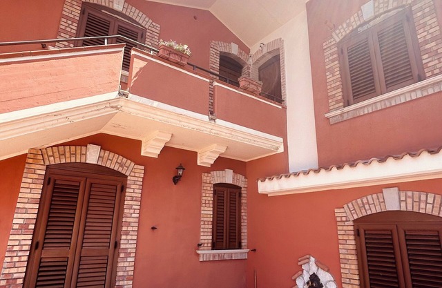 "Set in a beautiful natural setting and surrounded by lush gardens."
