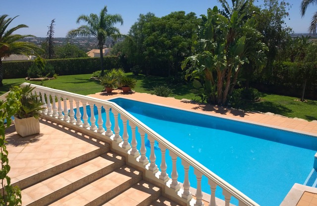 Set in an acre with coastal views, heated pool and close to many golf courses
