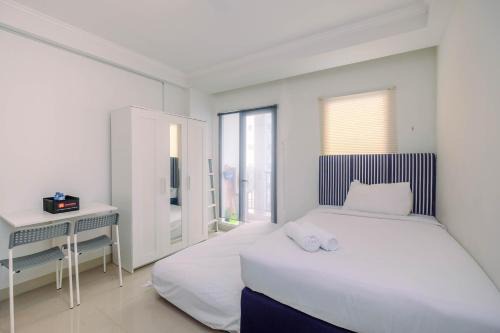 Simply Clean and Spacious Studio Signature Park Grande Apartment By Travelio