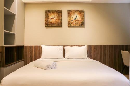 Simply Look Studio Room Gateway Park LRT City Jatibening Apartment By Travelio