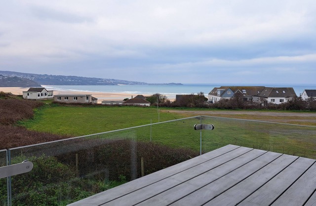 Situated in a sea front position with views extending towards St. Ives Bay