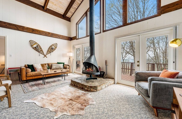 Ski chalet-inspired getaway with mountain views & wood-burning fireplace