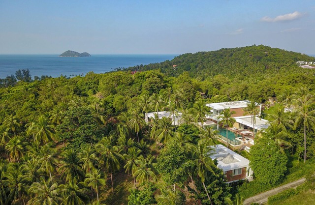 Sleek and spacious palatial family-style villa with a large garden
