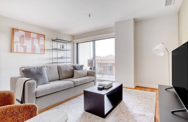 Sleek Clarendon 1BR W/D, Concierge & Gym, steps to WF, by Blueground