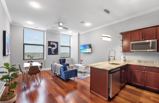 Sleek Residence with Rooftop Pool, Gym, and Concierge Service