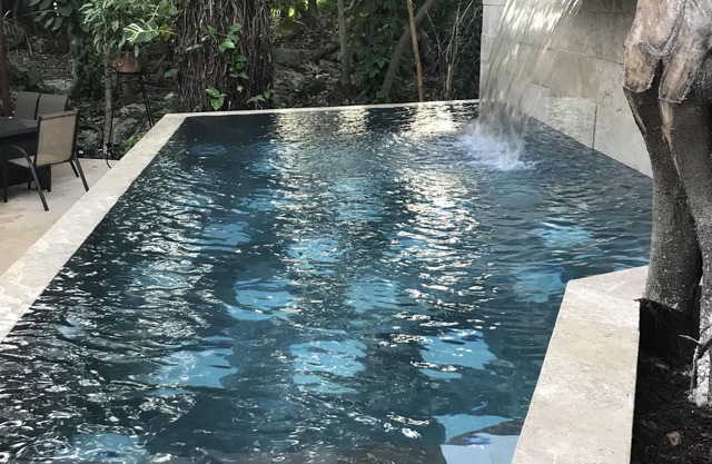 Sleeps 12 short walk to the best beach in Playa, Infiniti pool, AC in all rooms