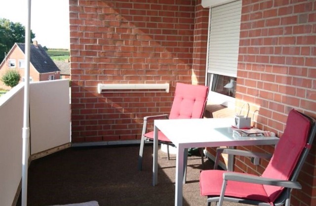 Small holiday apartment in Dornumersiel with a dog