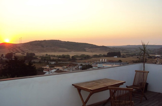 Small multi-storey house with beautiful roof terrace, involved in village life