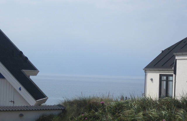 Small romantic fisherman with sea and beach
