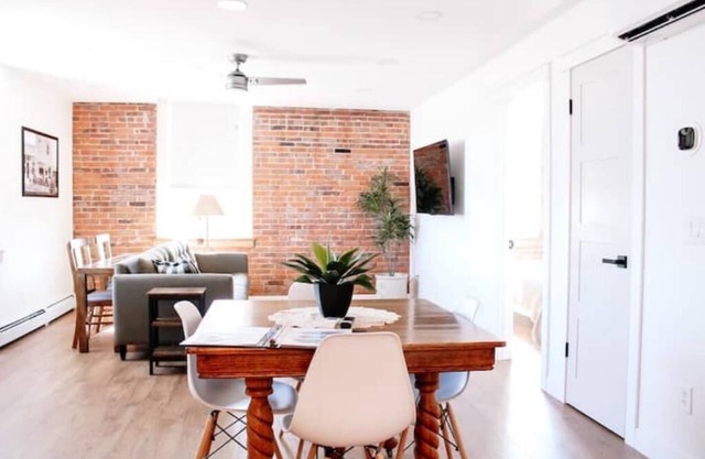 Small-Town Loft: Harvester - Modern Comfort in 1890 Historical Brick Building