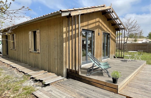 Small wooden house on the edge of a forest