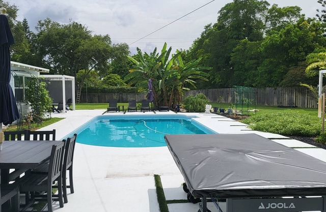 Spacious 4-bedroom house in family friendly Coral Springs with all amenities.