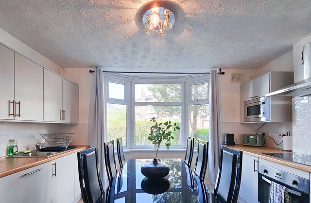 Spacious 6-Bed Home with Driveway