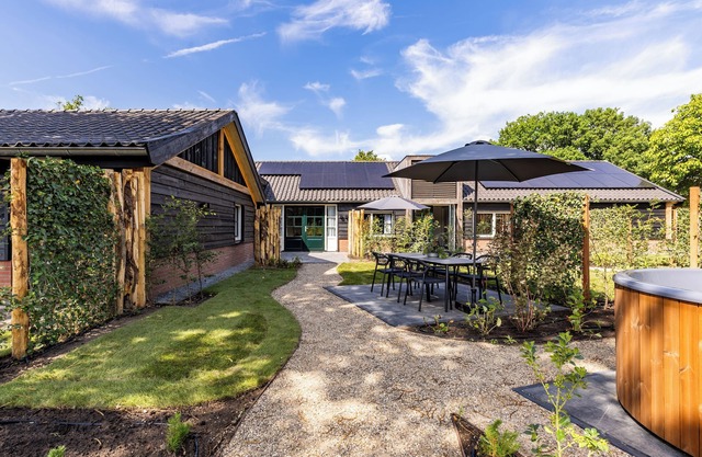Spacious 6-person home with a private hot tub in the garden. Stylish, single-floor layout with all modern comforts.