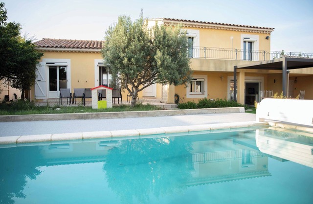Spacious air-conditioned villa with pool on enclosed garden for 8 to 10 people.