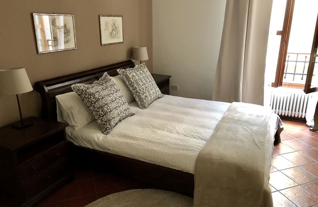 "Spacious and Elegant Apartment Full of Charm in Bologna's Historic Heart"