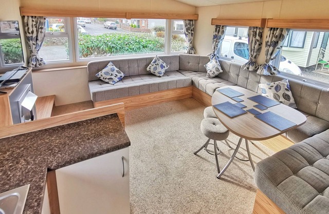 Spacious and well-presented 12ft-wide caravan with one double and one twin.
