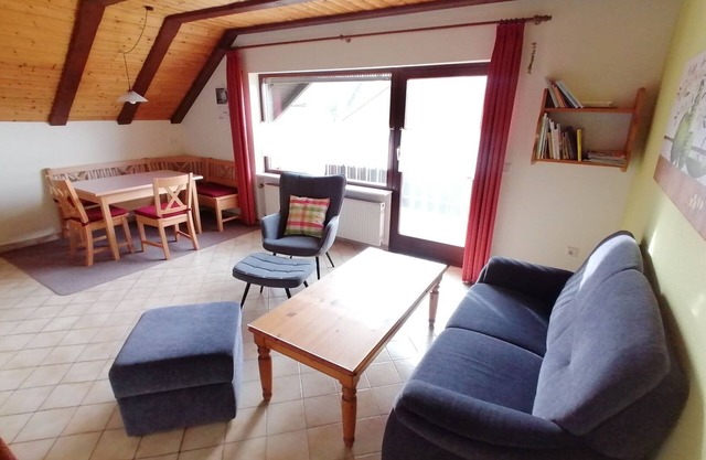 Spacious apartment with balcony, garden and free WiFi