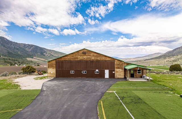 Spacious aviation themed home w/spectacular views.