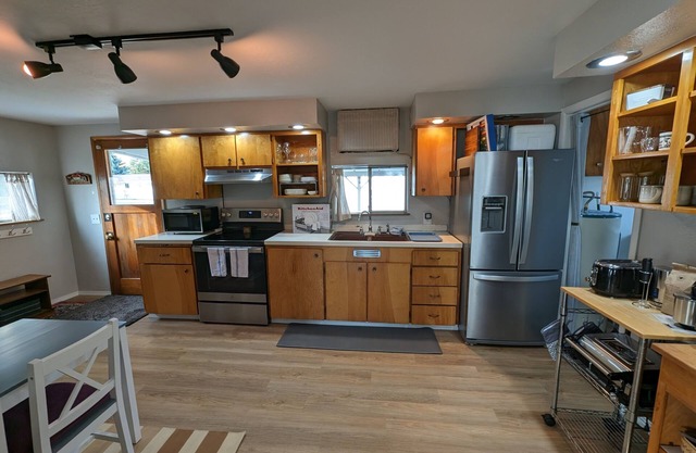 Spacious bungalow-style house with veranda, yard, and full amenities