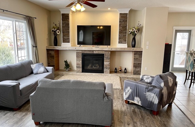 Spacious bungalow with large backyard and garage close to West Ed Mall