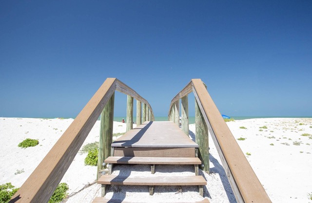 Spacious corner unit on Pass-A-Grille Beach. Heated pool. Enjoy the best the area has to offer.