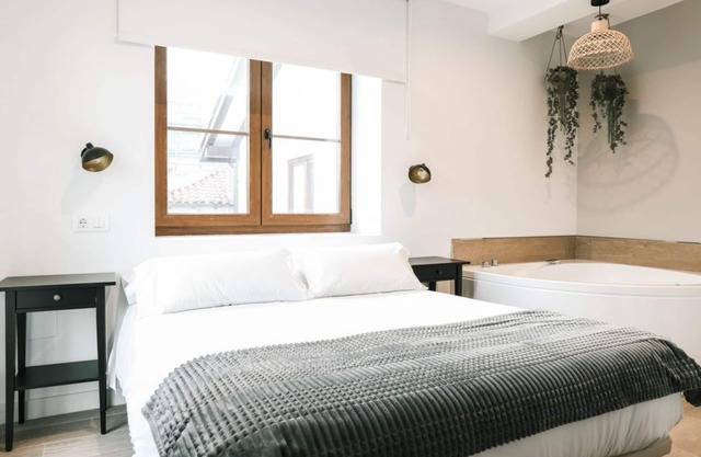 Spacious apartment with spa and balcony.