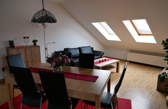 Spacious holiday home (100sqm) in the attic with a view of the vineyards