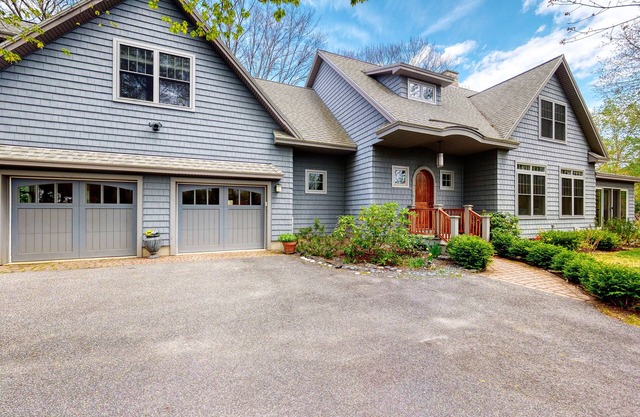 Spacious home with sunroom, yard, & fireplace - close to town & sites